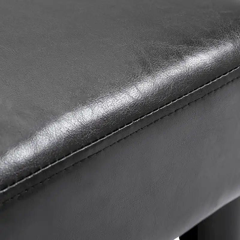 Repose-pieds ottoman rectangulaire en similicuir noir avec siège en mousse rembourrée et pieds en plastique